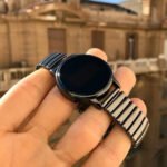 ⁦عرض ( ساعة تاتش دائرية أسود + محفظة رجالي + سماعة بلوتوث مغناطيسية)⁩ - الصورة ⁦3⁩